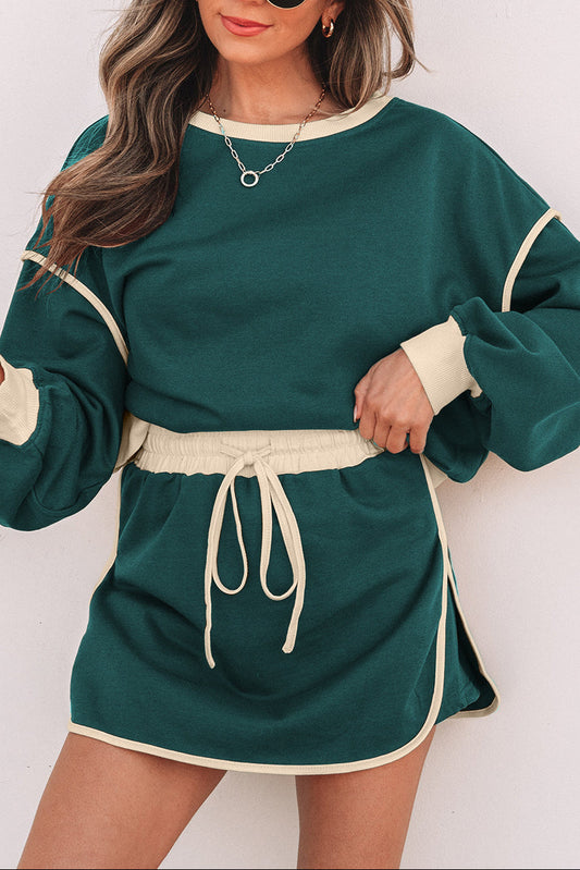 Evergreen Color Contrast Loose Pullover and Lace-up Waist Skort Set